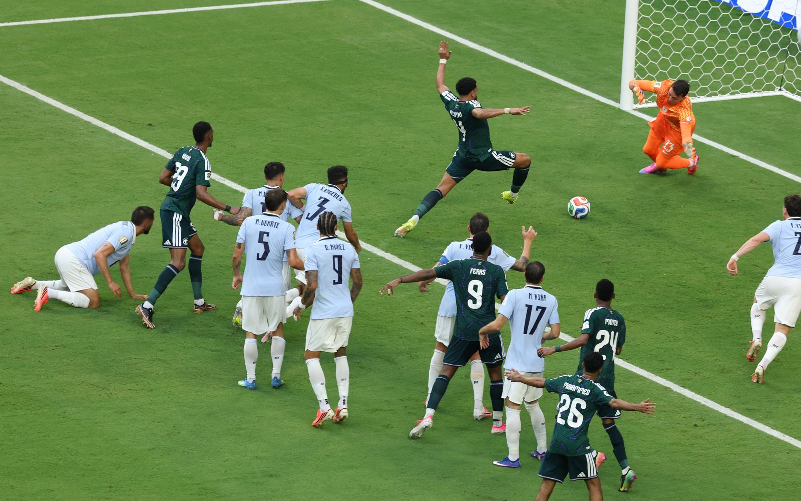 Abdulelah Alamri scoring against Uruguay