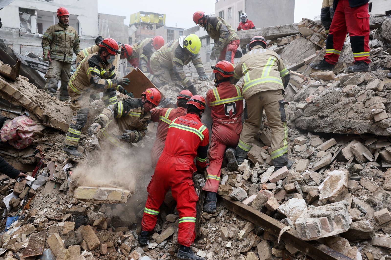 Emergency responders search rubble after strike south of Tehran