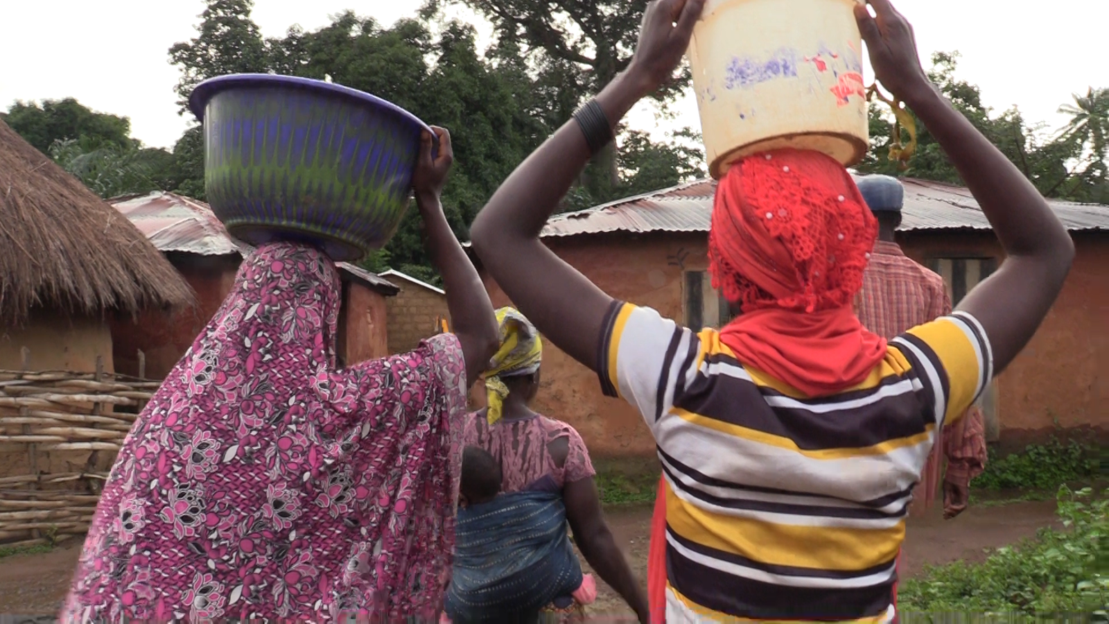 Locals collecting water at communal tap