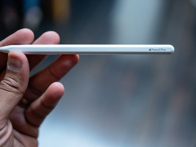 Person holding the Apple Pencil Pro