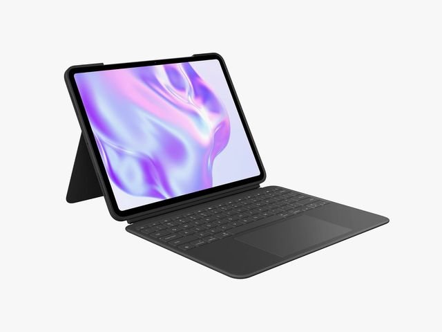 Tablet attached to detachable keyboard stand