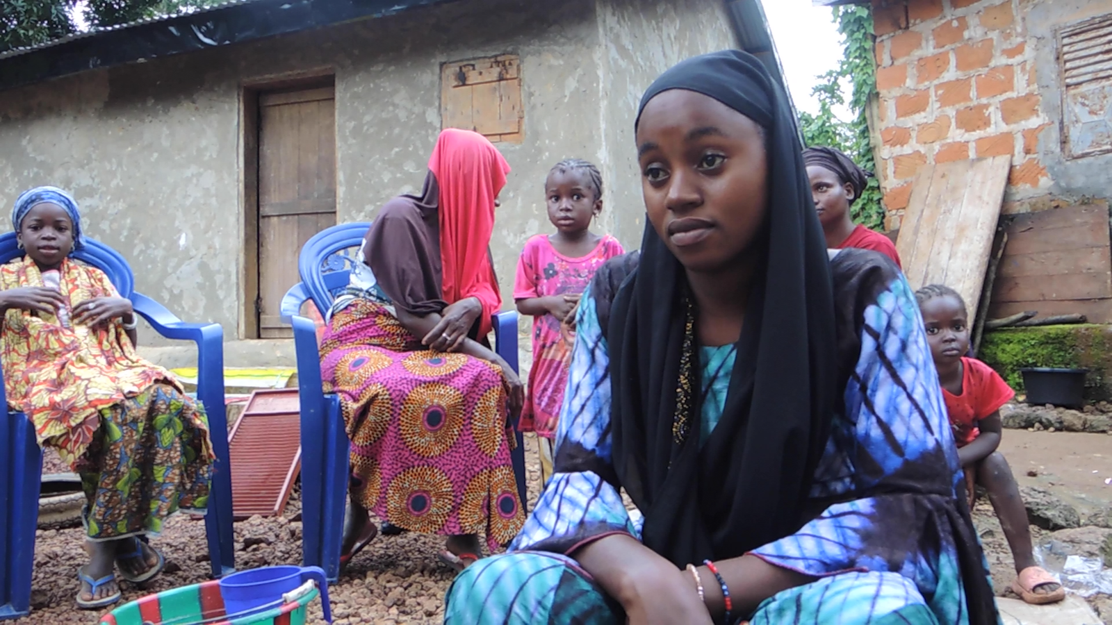 resident Fatoumata binta Bah lamenting lost farmland
