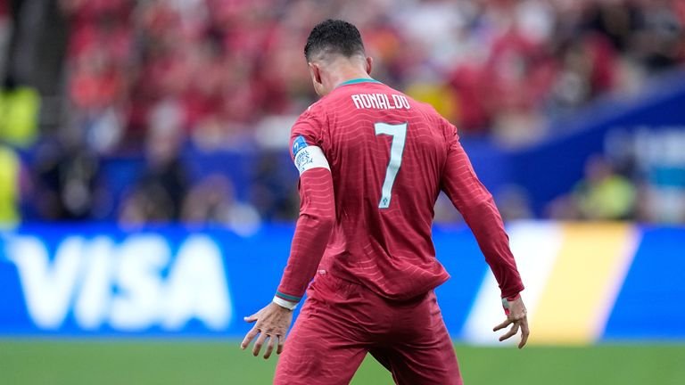 Cristiano ronaldo celebrating after scoring for Portugal