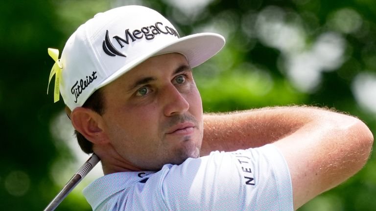 J.T. Poston watches his tee shot during final round of The Memorial