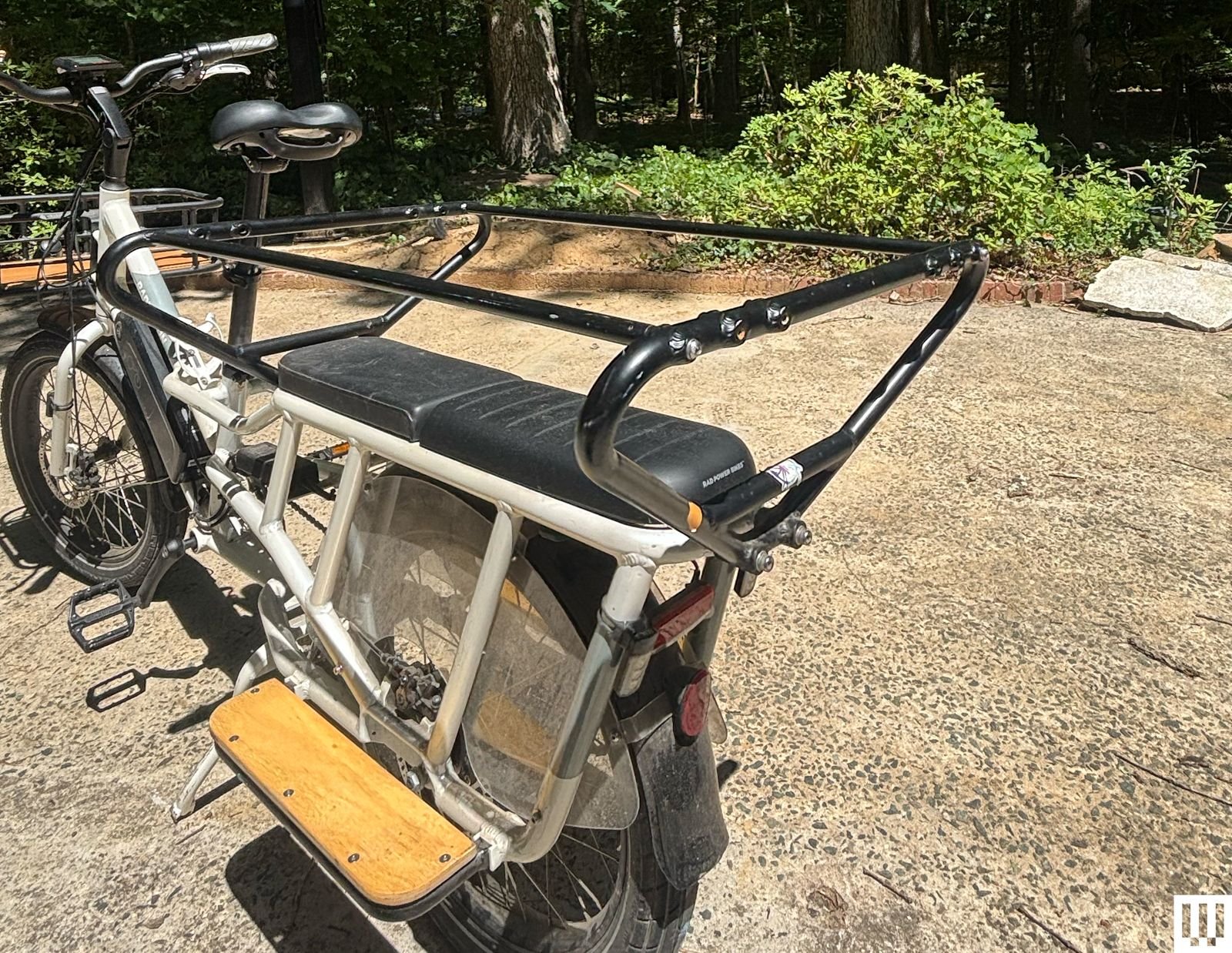 Family riding an electric cargo bike