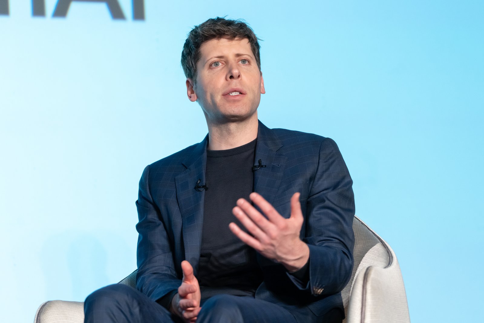 Sam Altman representing leadership behind US-based efforts promoting accessible artificial intelligence technology worldwide