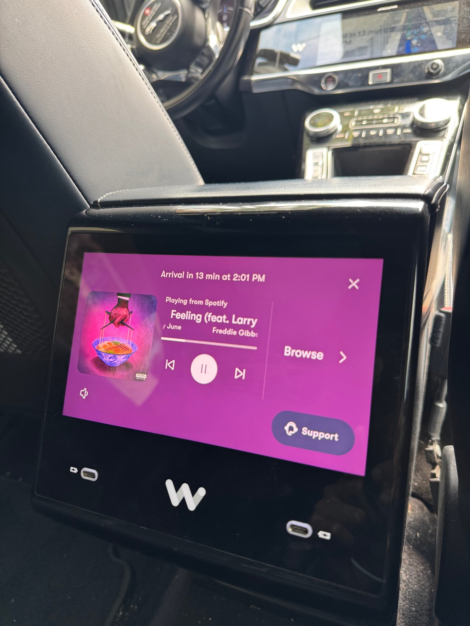Passenger enjoying music via spotify integration inside a Waymo autonomous vehicle