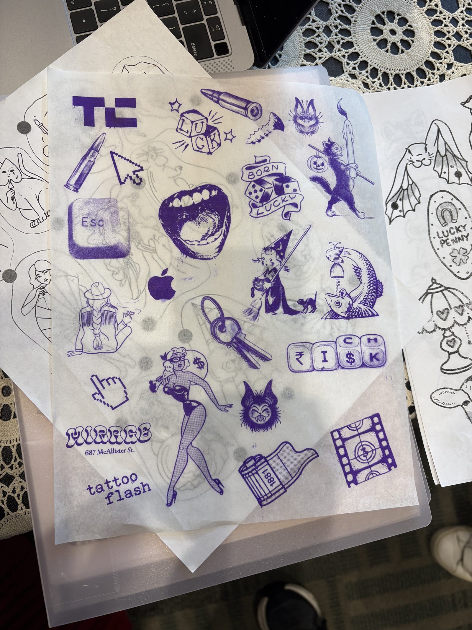 Tattd flash sheet featuring various designs