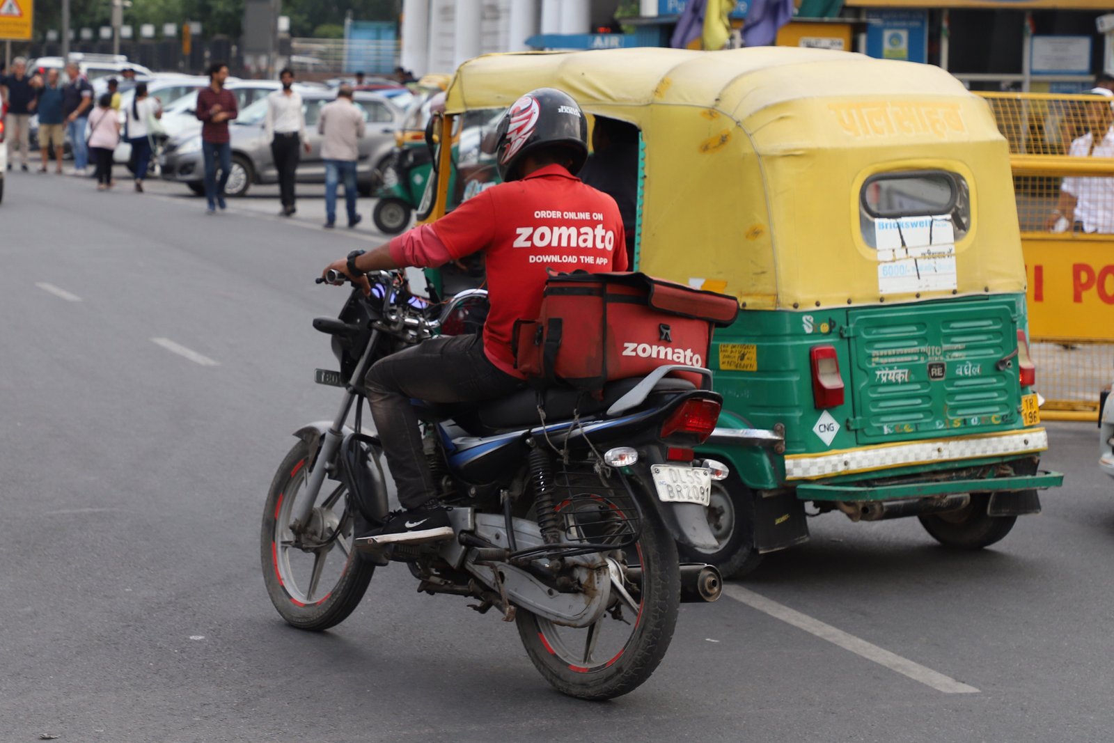 Delivery worker navigating busy streets in Mumbai
