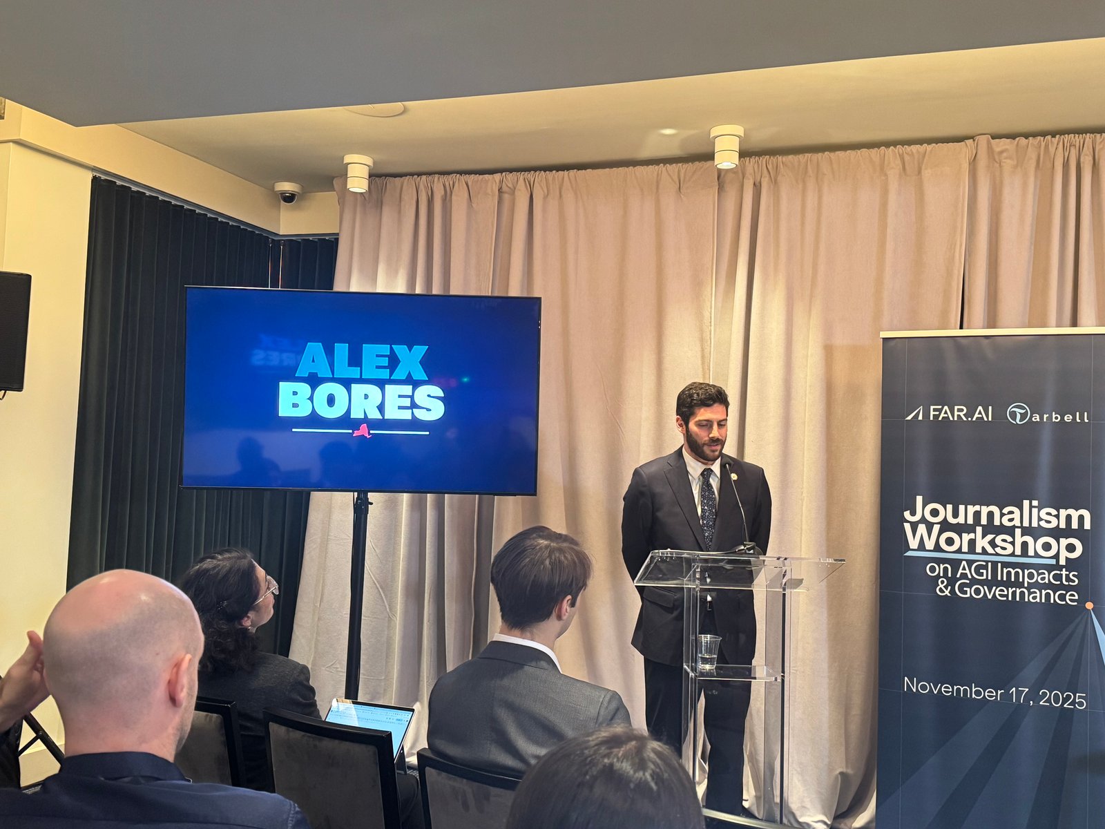 Alex Bores speaking at an event