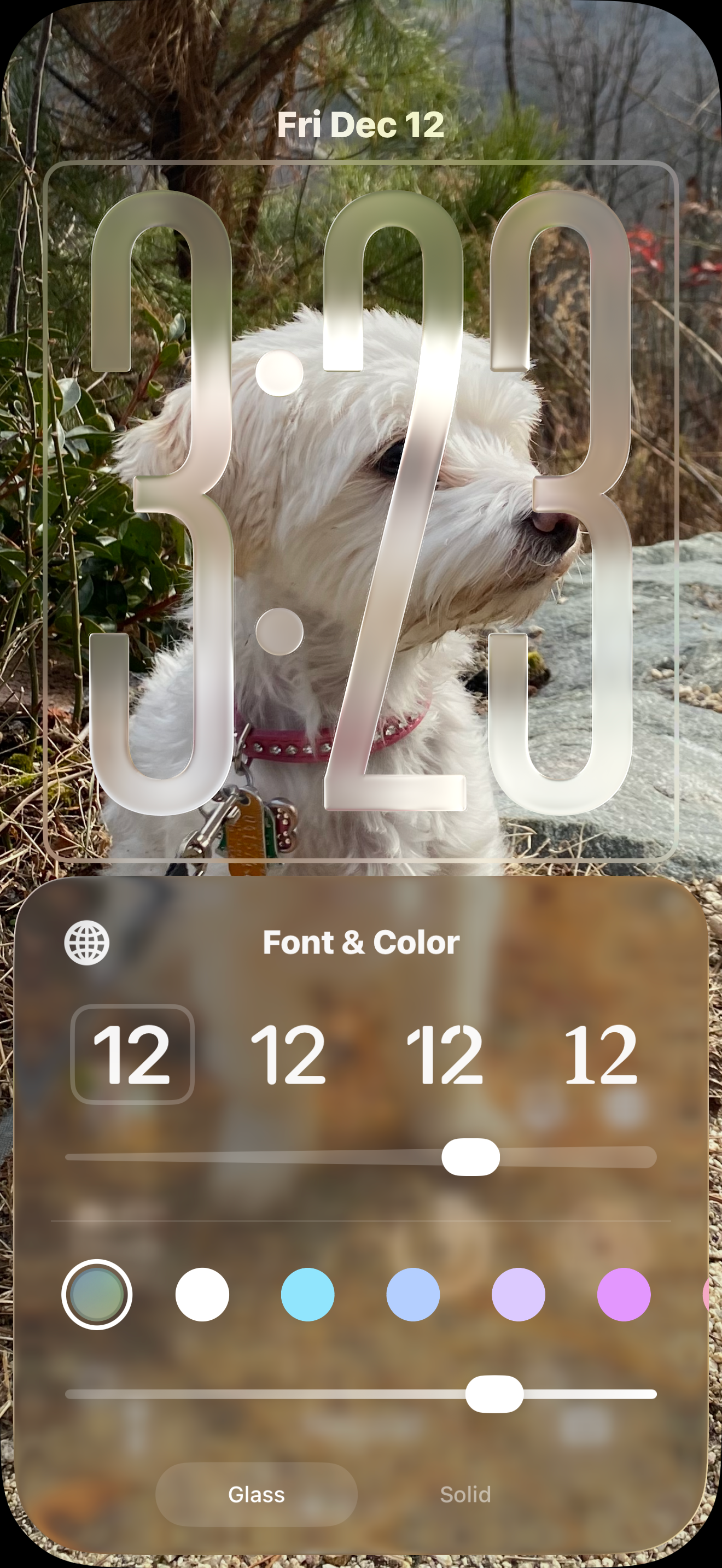 Lock screen showing new setting for adjusting Liquid Glass transparency from glassy to solid
