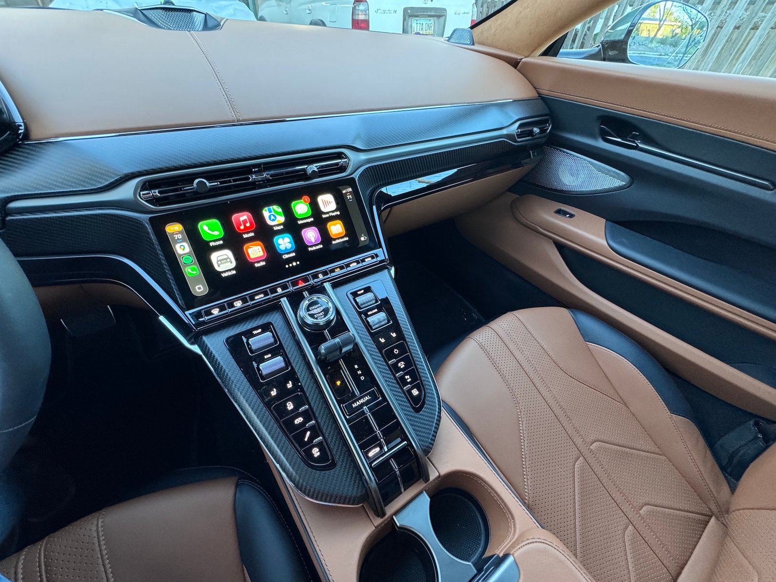 Aston Martin Vantage roadster interior showcasing Apple CarPlay Ultra